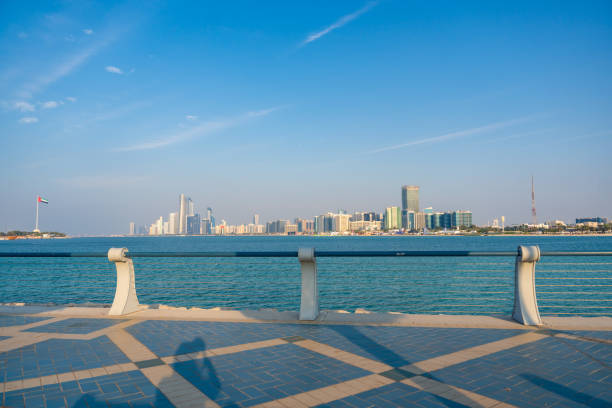 Abu Dhabi, UAE - Desember 4, 2023: Panorama view of Abu Dhabi skyline with water, UAE. High quality photo