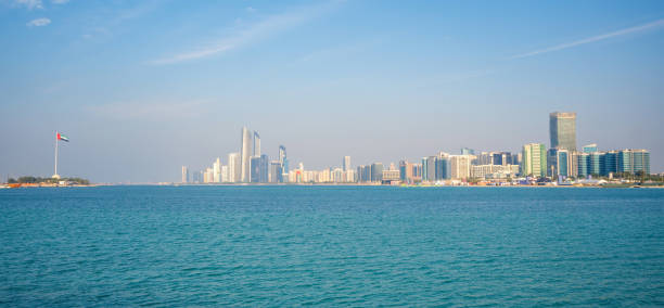Abu Dhabi, UAE - Desember 4, 2023: Panorama View of Abu Dhabi Skyline at sunset, United Arab Emirates. High quality photo