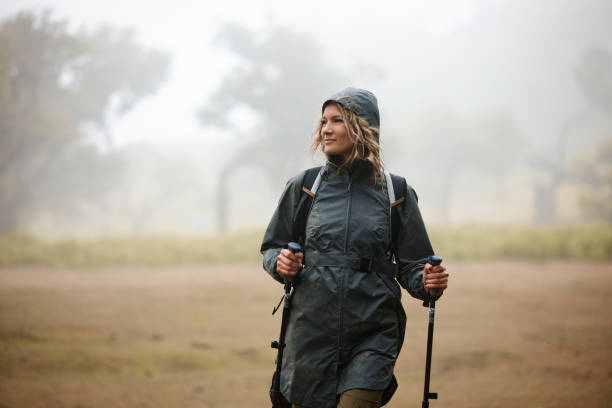 istock Carefree female backpacker taking a hike through nature. 1979726000
