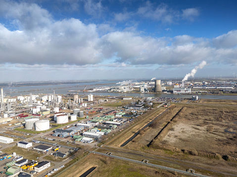 Moerdijk Netherlands.  Refinery and petrochemical industry with in the background  oil tanker inland-shipping harbor. Drone point of view.