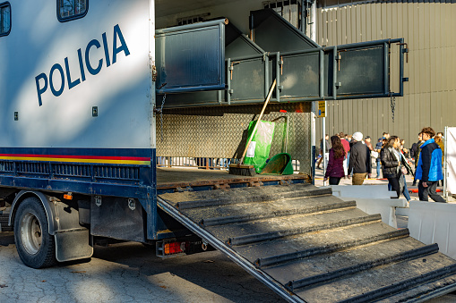 Madrid, Spain. At large events where large crowds gather, the police monitor the environment mounted on horses, which are transported in trucks designed for animal transportation