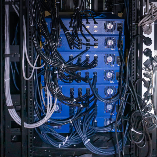 istock Back side of network servers in the rack with cable and power connections. 1979755366
