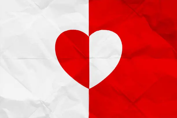 Vector illustration of One big vibrant halved divided heart shape  at the centre  of plain red and white coloured crumpled paper textured creased vector backgrounds with folds or fold marks