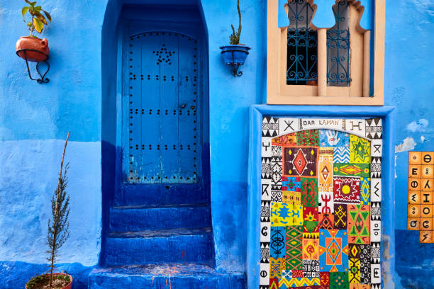 Front view of colorful building facade with tile pattern in Chefchaouen, Morocco, North Africa.