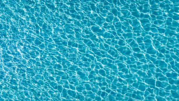 istock Summer Tropical beach water  with crystal clear water on beach background 1979825839