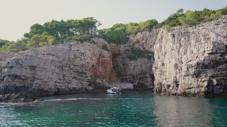 Steep  Cliffs With Vegetation On Beautiful Island