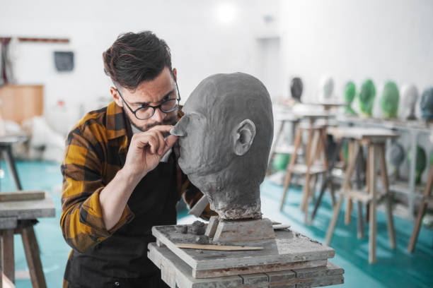 istock Artist Sculpting a Head with Precision 1979834468