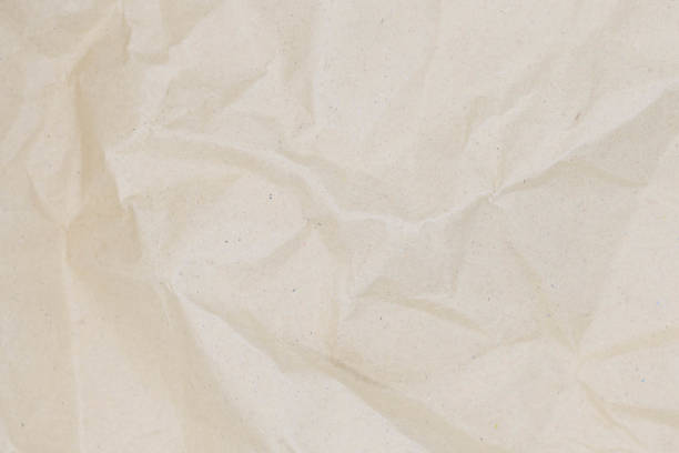 istock Old brown paper texture or background for design with copy space for text or image 1979861445