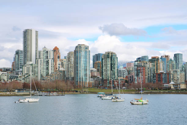 Vancouver, British Columbia - July 25, 2023: The view of Coal Harbour seaside park, Vancouver, Canada.