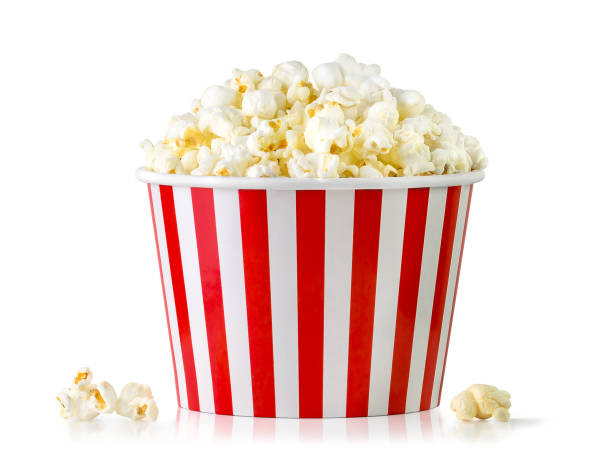 istock Popcorn in red and white striped bucket isolated on white background 1979878485