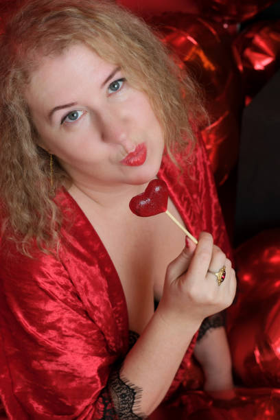 istock An older, pretty, fair-haired, curly woman 1979899853