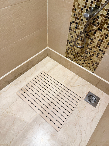 Stock photo showing close-up, elevated view of a luxury bathroom with glass shower cubicle.