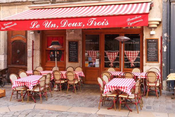 Lyons-la-Fôret, France - August 30, 2025: Lyons-la-Fôret is a hidden gem situated in the heart of Normandy’s largest forest. The village consists of half-timbered, pink brick or tinted cob (clay and straw) houses, and boasts tearooms, little restaurants, antiques shops and the beautiful 18th-century timber-framed covered market.