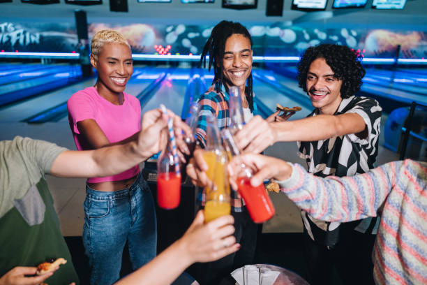 istock Friends toasting at a bowling club 1979959255