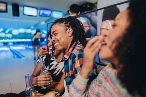istock Friends embracing at a bowling club 1979959256