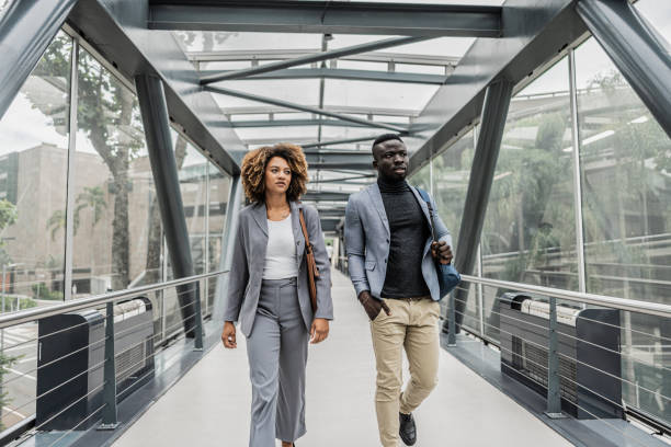 istock Business people walking on a footbridge 1979965198