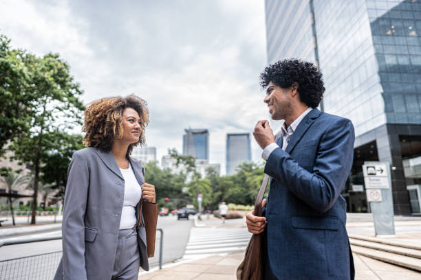 istock Coworkers talking outdoors 1979965494