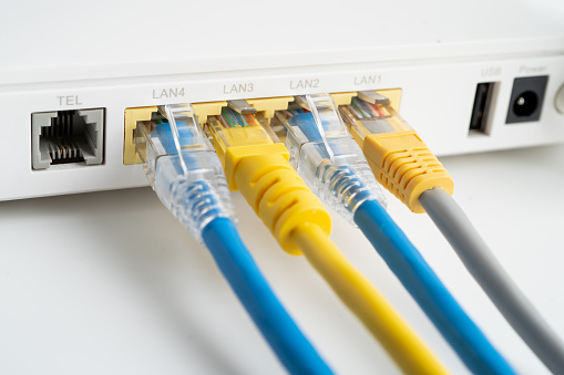 Ethernet cable with wireless router connect to internet service provider internet network.