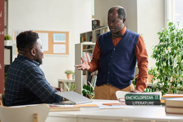 istock Black Senior Professor Consulting Student 1980003972
