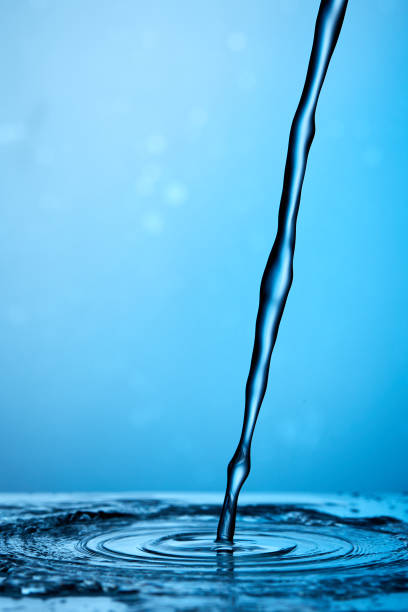 istock Splash Of Water Over Blue Background 1980009820