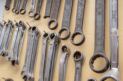 workshop board with wrenches and tools