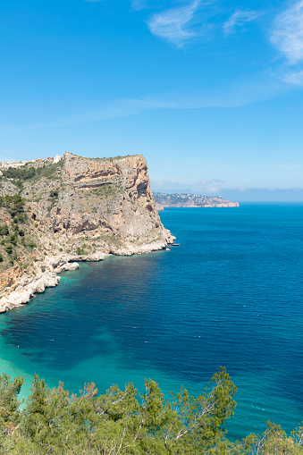 Landscape of rocky cliffs and coves on the Mediterranean coast in Alicante - Spain