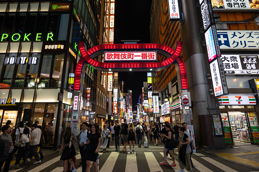 Tokyo, Japan - September 20, 2023 : People at the Kabukicho in Shinjuku, Tokyo, Japan. Shinjuku District is a major commercial and entertainment district in Tokyo.