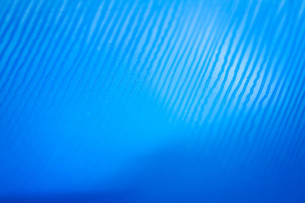 istock Macro shot of blue marbled vinyl record 1980095771