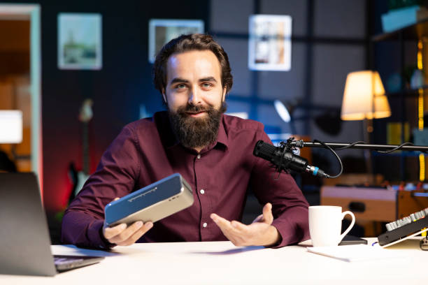istock Influencer happy with sound coming from high end music playing device 1980096337
