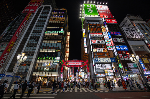 Tokyo, Japan - September 20, 2023 : People at the Kabukicho in Shinjuku, Tokyo, Japan. Shinjuku District is a major commercial and entertainment district in Tokyo.