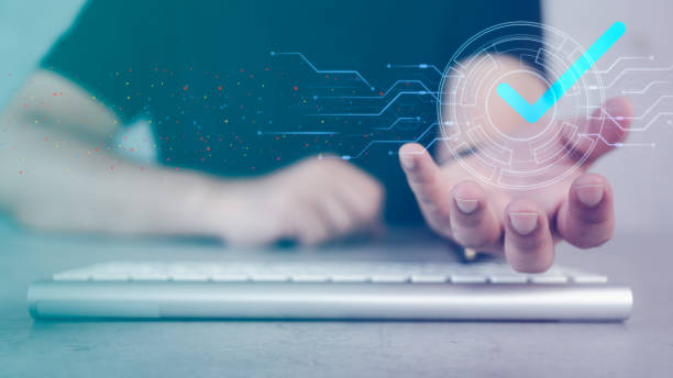 istock Man hands showing virtual of validation to confirm transaction or approve to access data. 1980111698