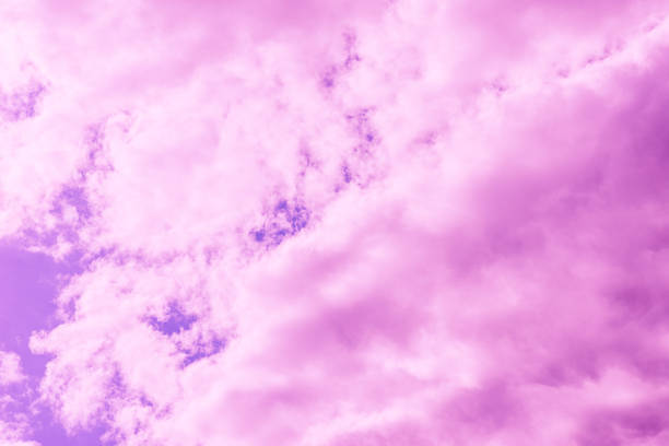 istock Beautiful dramatic pink cloud sky purple and violet tones Background.Toned. 1980162327