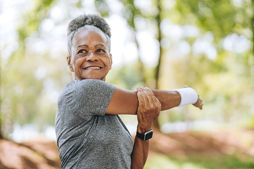 Mature woman stretching