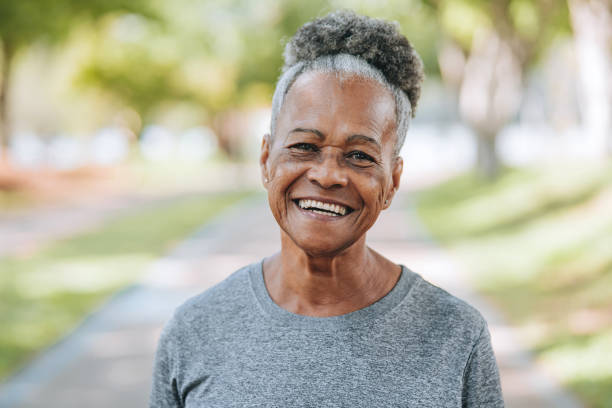 istock Senior woman smiling looking at camera 1980166666