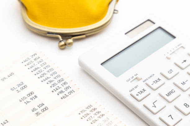istock Calculator, wallet and bankbook. 1980202242