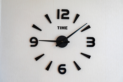 modern clock on an entire wall in the house