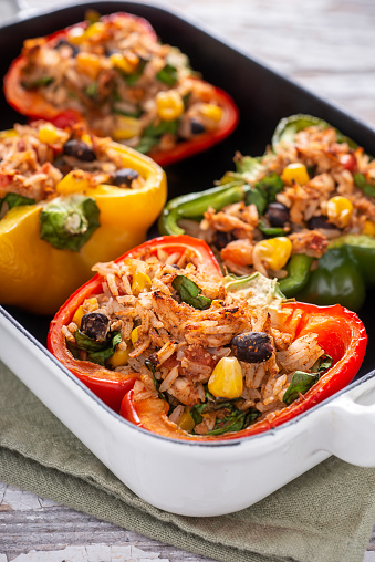 Southwestern Stuffed Peppers with Chicken, Rice, Black Beans, Tomato and Corn