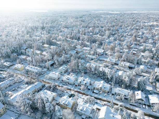 snow-covered suburban houses seen from above - satellite view aerial view cityscape suburb fotografías e imágenes de stock