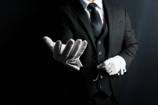 istock Butler Offering Helping Hand 1980312560