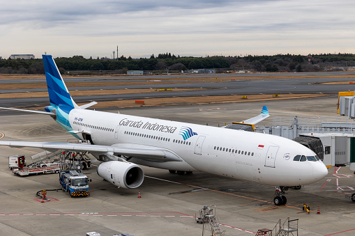 Narita, Japan - December 19, 2023 : Garuda Indonesia Airbus A330-300 at Narita International Airport in Japan.