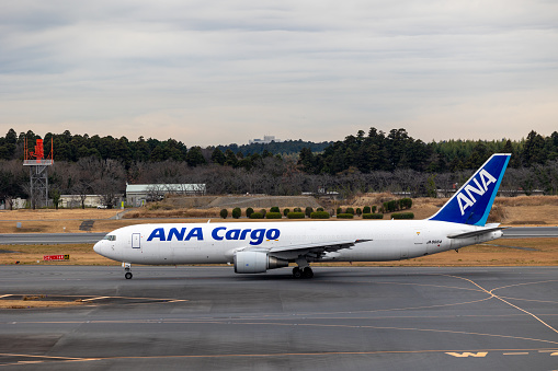 Narita, Japan - December 19, 2023 : ANA Cargo Boeing 767-300 at Narita International Airport in Japan.