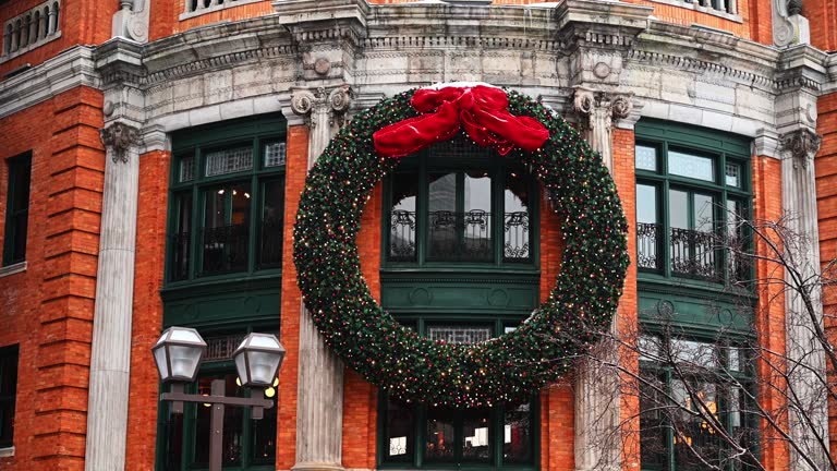 Huge Christmas wreath on exterior building wall