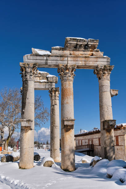 Ceremonial Gate (Pillars) at Uzuncaburc (Diocaesarea) , Mersin - Turkey Ceremonial Gate (Pillars) at Uzuncaburc (Diocaesarea) , Mersin - Turkey (2024) uzuncaburc stock pictures, royalty-free photos & images