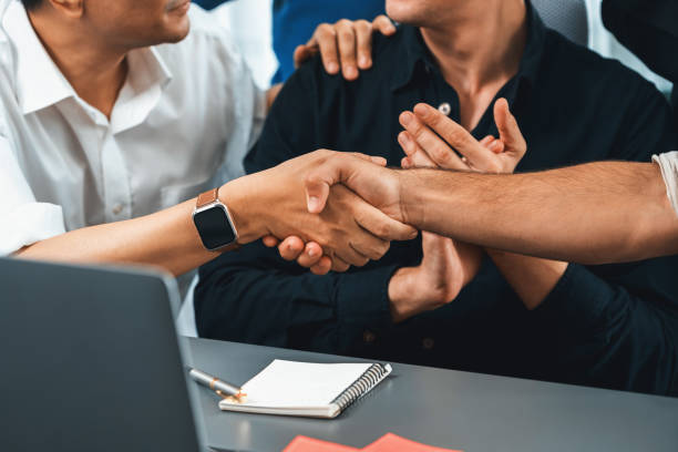 istock Group of diverse office worker employee shake hand and working together. Prudent 1980403585