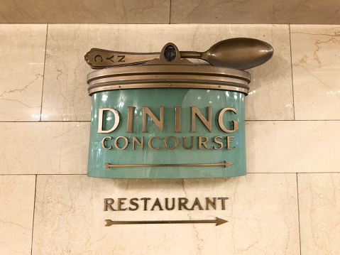 Dining concourse sign on a wall