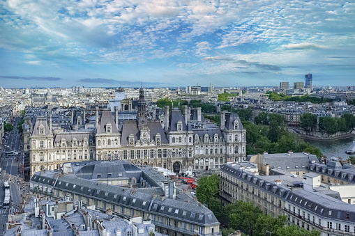 Aerial view of french architecture buildings with Eiffel Tower background. Champs-de-Mars.