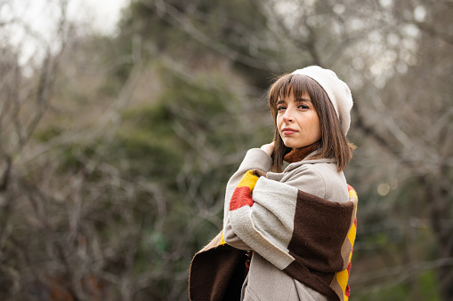 Pretty young woman portrait in public park.
Istanbul - Turkey.