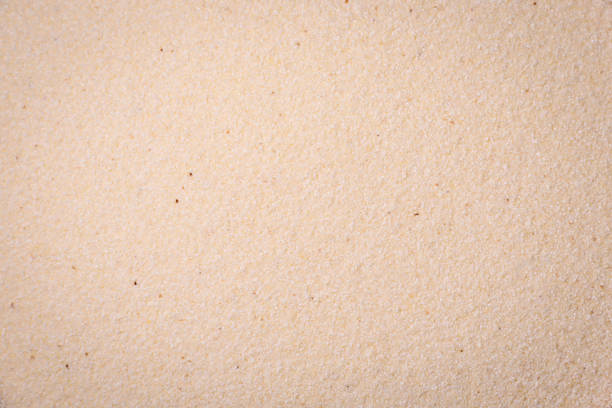 Semolina wheat grains are white in raw form. Cooking delicious nutritious porridge