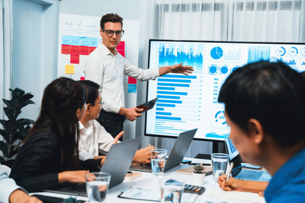 istock Presentation in office or meeting room with analyst team. Prudent 1980494292