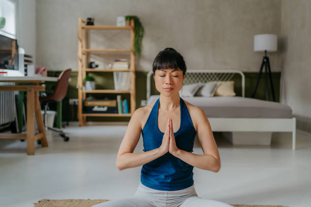 istock Yoga class at home 1980527107